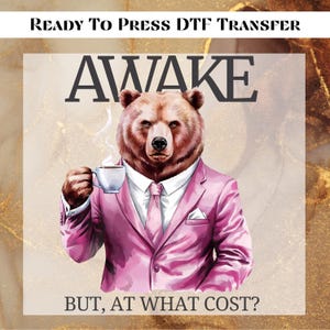 May include: A brown bear wearing a pink suit and a tie, holding a cup of coffee. The bear is looking at the camera. The text "AWAKE" is above the bear and the text "BUT, AT WHAT COST?" is below the bear.