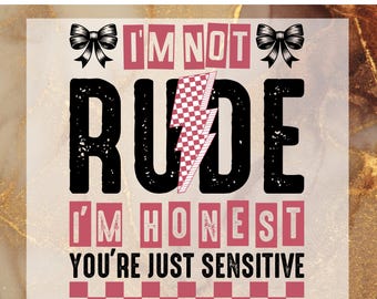 May include: Ready to press DTF transfer design with black text that reads "I'm not rude I'm honest you're just sensitive" with a pink lightning bolt and pink bows on either side of the text.