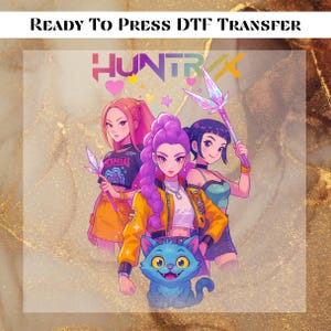 May include: A DTF transfer featuring three anime-style women with colorful hair and outfits, holding fantasy weapons. A blue cat with a smiling face is in the foreground. The text "READY TO PRESS DTF TRANSFER" and "HUNTRX" are at the top.