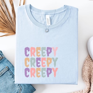 Creepy but Cute Pastel Goth Halloween T-shirt for trick or treating, parties or just celebrating spooky season