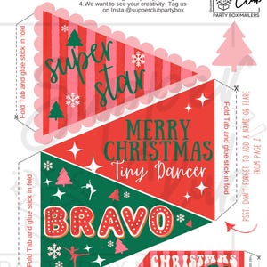 May include: Printable Christmas banner with red, green, and pink pennants. The banner includes the phrases "Super Star", "Merry Christmas Tiny Dancer", "Bravo", and "Christmas Vibes". The design features snowflakes, stars, and Christmas trees.