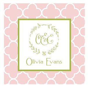 May include: A green and white monogram with the letters "O & E" inside a wreath on a white background with a green border. The text "Olivia Evans" is below the monogram.