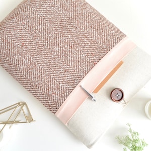 Custom size ipad or tablet sleeve. Light brown herringbone and peach design. Lightweight and padded to protect your tablet on the go.