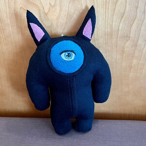 homunculus #63, an upcycled woolen soft sculpture / art plushie