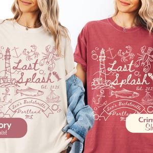 May include: Ivory and crimson shirts with a nautical-themed graphic. The design includes a lighthouse, fish, lobster, and the text "Last Splash Est. 2025". The shirts also feature the text "Lex's Bachelorette Portland ME".