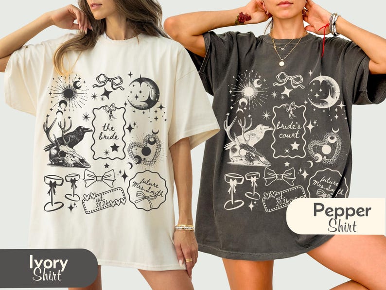 May include: Two oversized t-shirts, one ivory and one grey, with a black and white graphic print. The design includes a deer skull, raven, moon, stars, and text. The ivory shirt says "the bride". The grey shirt says "bride's court".