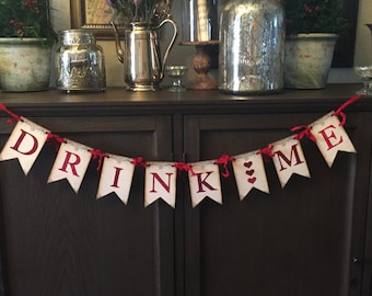 Drink Me, Eat Me, Take Me Banners, Red Glitter letters, red crinkled ribbon