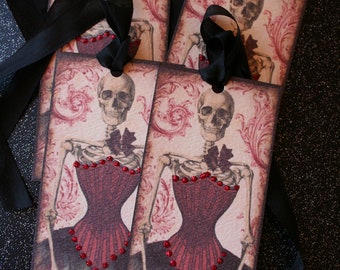 Set of 4 Dressed skeleton tags, with stickles glitter.