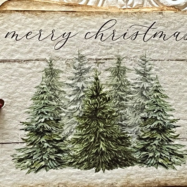 Set of 12 Merry Christmas tags, with snowy tree scene.