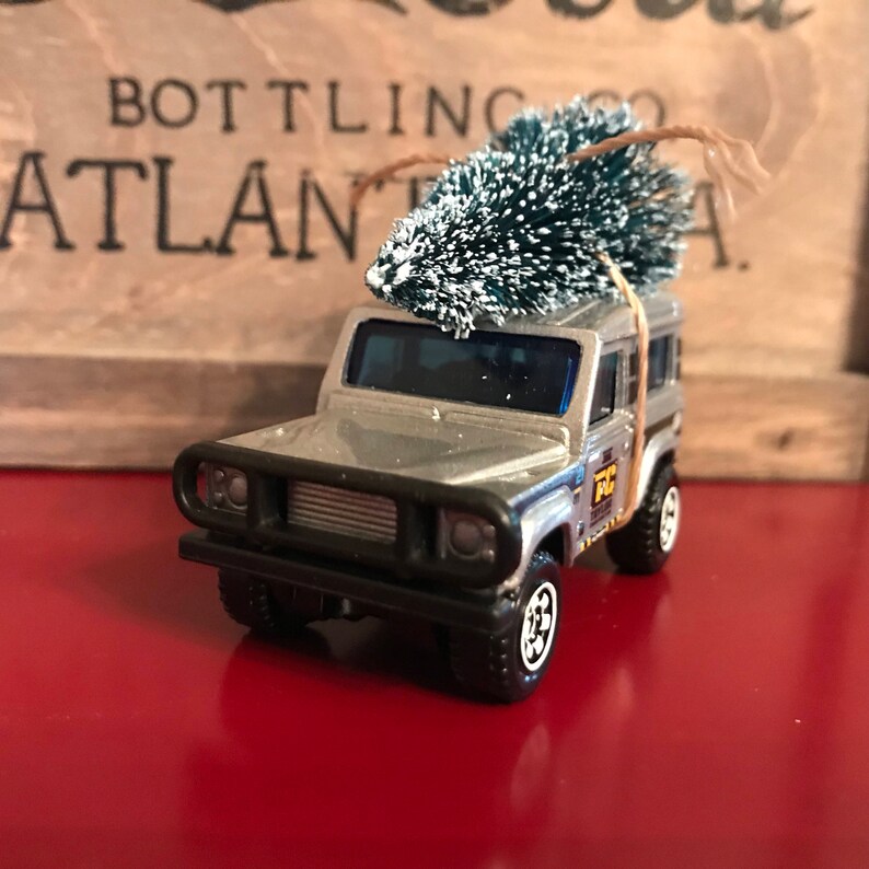 Land Rover Carrying Christmas Tree Ornament Etsy