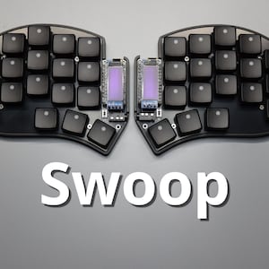 May include: A split ergonomic keyboard with black keycaps and a gray base. The keyboard has two halves, each with a display screen. The word "Swoop" is displayed in white text below the keyboard.
