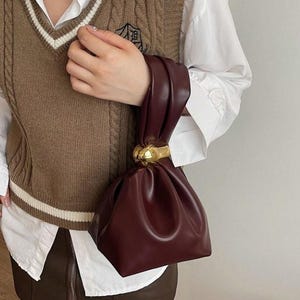 Einfache lässige Kordelzug-Eimer-Einkaufstasche, modische Handtasche mit dekorativem Design für Frauen