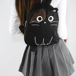 Fashionable Cat Themed Canvas Backpack - Adorable Animal Print, Zipper Closure, Polyester Lining
