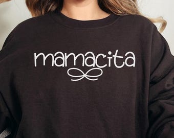 Mamacita cute sweatshirt with bow design, cozy and trendy Spanish mom sweater, perfect gift for Mother’s Day, birthdays, or everyday wear.