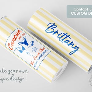 May include: Two cylindrical tumblers with yellow and white stripes. One tumbler has the name "Brittany" in blue script. The other has "Cancun July 2026" and bikini graphics. Text reads "The Bach Club Olivia's Bachelorette".