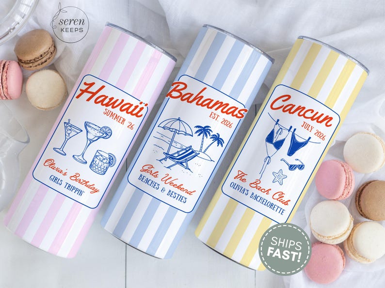 May include: Three travel tumblers with vertical stripes in pink, blue, and yellow. Each tumbler has a label with a destination name, date, and themed illustrations. The labels read "Hawaii," "Bahamas," and "Cancun."
