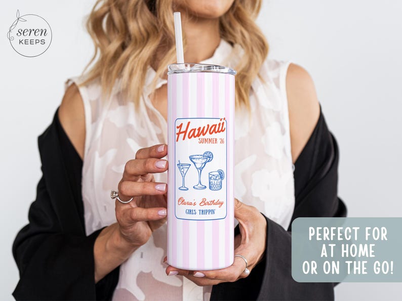May include: A pink and white striped tumbler with a straw, featuring a label that reads "Hawaii Summer '26" with cocktail illustrations. The tumbler is designed for home or on-the-go use.
