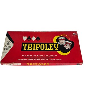May include: A vintage Tripoley game box, featuring a red background with the game title in yellow. The box includes illustrations of playing card suits and a king and queen. The text reads "The Game of Kings and Queens".