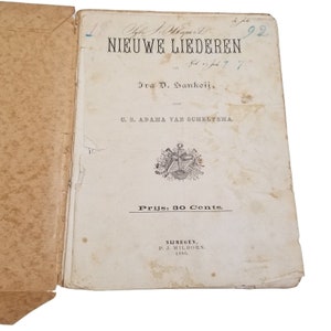 May include: A vintage book cover with the title "NIEUWE LIEDEREN" by Jra D. Sankeij. The book was published in 1886 by P.J. Milborn in Nijmegen.