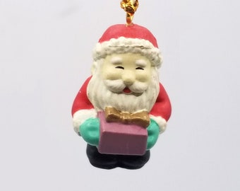 Vintage Christmas Ornament Mini Miniature Santa Claus holding Gift Present PVC