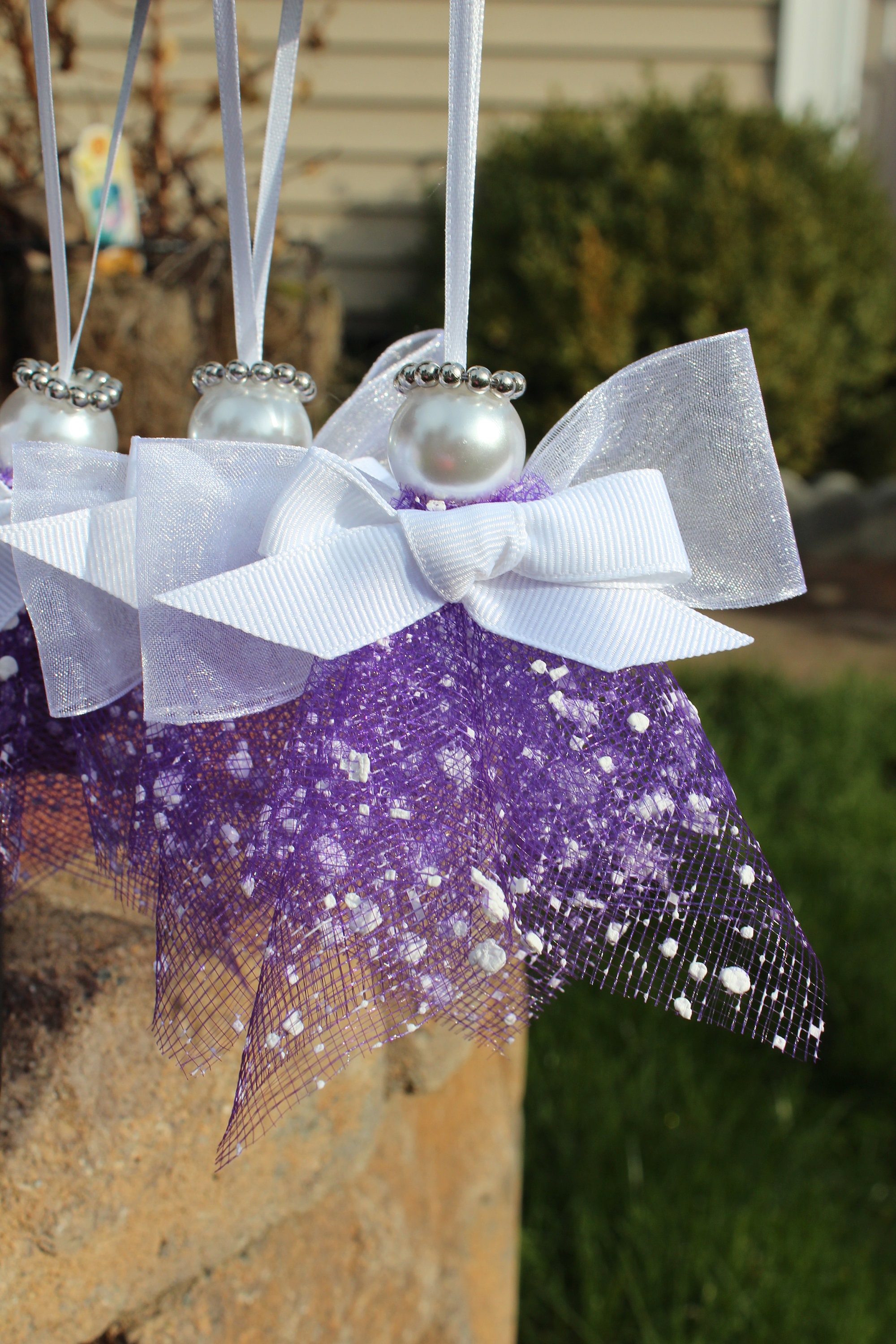 purple dressed black angel christmas light Mr. Christmas Fiber Optic Black Angel Tree Topper