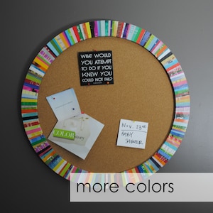 round cork board- made from recycled magazines,fun,colorful stripes,blue,green, red, purple, pink, yellow,bulletin board, round, circle