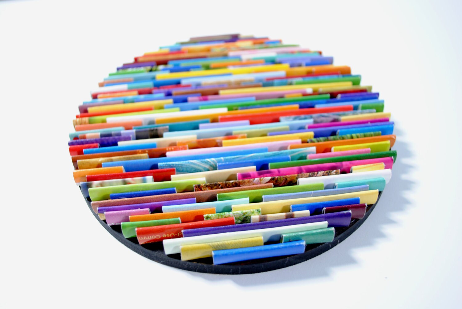 Round wall art made from recycled magazines colorful unique Etsy