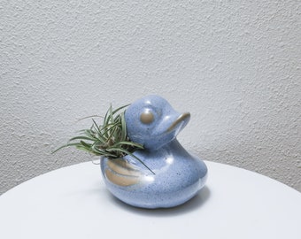 Blue stoneware duck plant pot figurine.