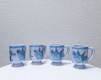 Set of 4 Ken Edwards ceramic bird pedestal mugs