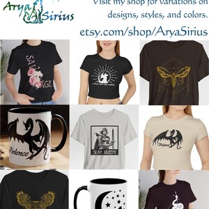 May include: A collection of mugs and t-shirts featuring various designs, including a dragon, an owl, a cat, a moon, a butterfly, and a snake. The designs are in black and white and are printed on black, white, and beige t-shirts and mugs. The text on the t-shirts includes "I Will Not Die Today", "Violence", "Slay, Queen!" and "The Moon Is My Friend".