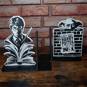 Harry Potter en Dobby als boekensteunen