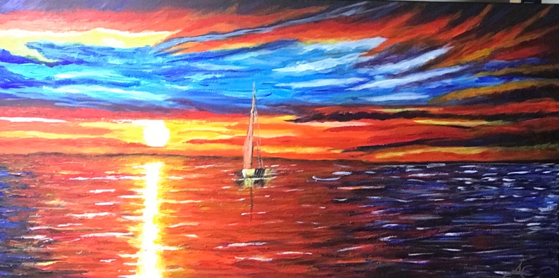 May include: A painting depicting a sailboat on a body of water at sunset. The sky is a vibrant mix of red, orange, yellow, and blue. The water is a deep blue with hints of red and orange reflecting the sunset.