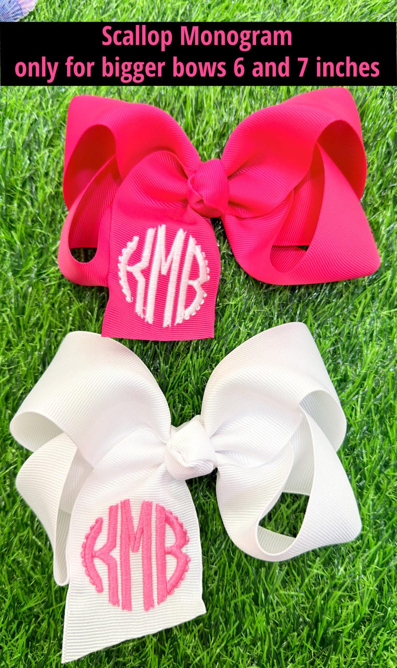 white and hot pink grosgrain ribbon hair bows, made with scallop monograms on the tails edge