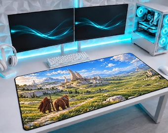 May include: A rectangular desk mat featuring a printed landscape illustration of a grassy field, distant white stone structures, and a figure walking alongside a large brown bear under a bright blue sky with scattered white clouds.
