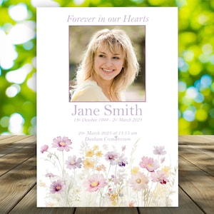 May include: A memorial card featuring a photograph of a woman, Jane Smith, with the text "Forever in our Hearts." The card displays her birth and death dates, and the time and date of her memorial service. Floral illustrations are at the bottom.