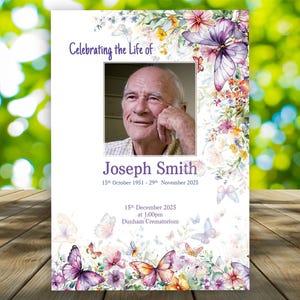 May include: A memorial card featuring a portrait of Joseph Smith, adorned with watercolour butterflies and floral elements. The card includes the text "Celebrating the Life of Joseph Smith", his birth and death dates, and service details.