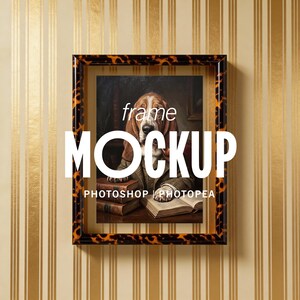 May include: A framed artwork featuring a Basset Hound in a tweed jacket, reading a book. The frame has a tortoiseshell pattern. The word "frame" is above the dog's head, and the word "MOCKUP" is in large white letters. The words "PHOTOSHOP | PHOTOPPEA" are at the bottom.