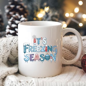 Its Freezing Season Funny Winter Coffee Mug Holiday Gift for Christmas Cocoa Tea Lovers Warm Beverage Cup White Ceramic Mug Glossy Finish