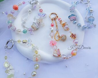 Correa para teléfono con cuentas iridiscentes: cordón de pulsera con dije de diamantes de imitación