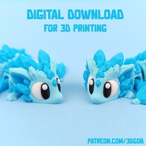May include: Two 3D printed blue crystal dragon figurines with black eyes. The figurines are facing each other. The text "DIGITAL DOWNLOAD FOR 3D PRINTING" is at the top of the image. The text "PATREON.COM/3DGOB" is at the bottom of the image.