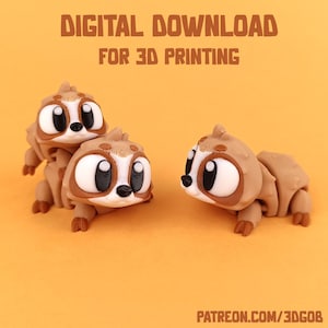 Puede incluir: Tres figuritas de perezoso impresas en 3D de color marrón con ojos grandes. Los perezosos están en una pose juguetona. La imagen incluye el texto "DESCARGA DIGITAL PARA IMPRESIÓN 3D" y "PATREON.COM/3DGOB".