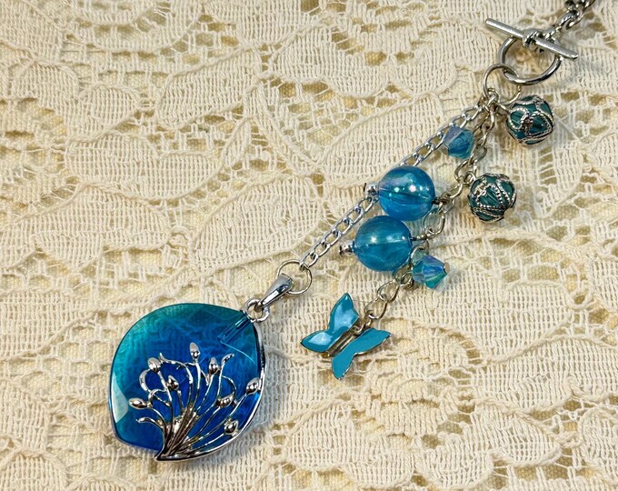 Blue Glass Butterfly Pendant Necklace – Layered Dangle Charm Necklace with Toggle Clasp – Whimsical Boho Jewelry Gift