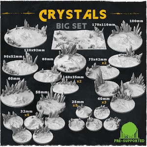 May include: A collection of pre-supported crystal bases in various sizes, from 25mm to 170x110mm. The bases are designed for tabletop gaming and feature detailed crystal formations on a textured surface. The set is labeled "CRYSTALS BIG SET".