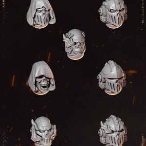 May include: A collection of twelve grey miniature heads arranged in a grid, featuring various designs including hooded skulls, armored helmets with vents, and flame-like hair textures. The text HEADS is at the top and GREYTIDE STUDIO is at the bottom.