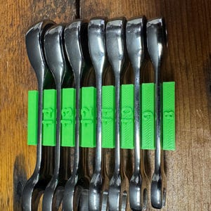 May include: A set of eight wrenches with green labels indicating sizes 8, 9, 10, 11, 12, 13, 14, and 17.