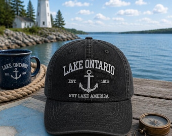Pet met geborduurde tekst "Lake Ontario, niet Lake America", pet met politieke satire, pet voor stil activisme, pet met protesthumor, Canadese pet met tekst "Lake Ontario".