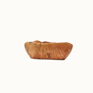 Front View of Unique Olive Wood Fruit Cup highlighting its rustic design and elegant craftsmanship.