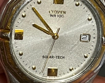 CITIZEN WR 100 date solar tech eco-drive stainless steel case and heavy band