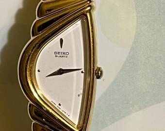 AVAILABLE // Vintage SEIKO Rivoli Gold Tone Half Moon Quartz