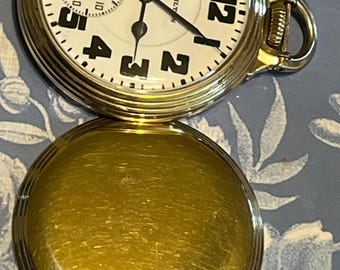 Reloj de bolsillo Hamilton 16s 992E 21jls ajustado a 5 posiciones, espiral ELINVAR, movimiento de doble rodillo n.° 2625295, esfera en negrita, números, rueda central dorada